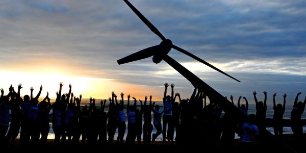 Greenpeace and Tcktcktck volunteers raise a wind turbine on the beach at dawn in Durban, South Africa. To send a message of hope for the latest round of UN climate change talks opening here on Monday. Campaigners say Durban must be a new dawn for the international negotiations to agree a fair, ambitious and legally binding treaty to avert climate chaos. They are demanding that politicians stop listening to the polluting corporations and listen to the people who want an end to our dependence on fossil fuels. Africa is on the front line of dangerous climate change, with millions already suffering the impacts through increased drought and extreme weather events, threatening lives and food security.